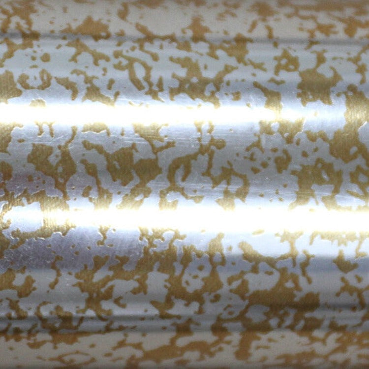 Roll of hot press foil silver color and gold splotch pattern. Can be used for multiple craft projects.