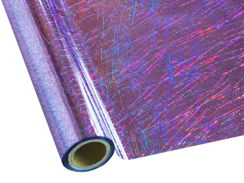 Roll of hot press foil with purple background and hologram confetti pattern. Can be used for multiple craft projects.