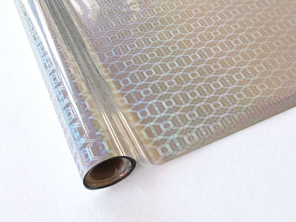 Roll of hot press foil with silver color and hexagon hologram pattern. Can be used for multiple craft projects.