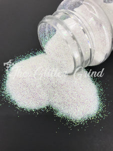 White with green and blue shimmer rainbow ultra fine cut polyester glitter