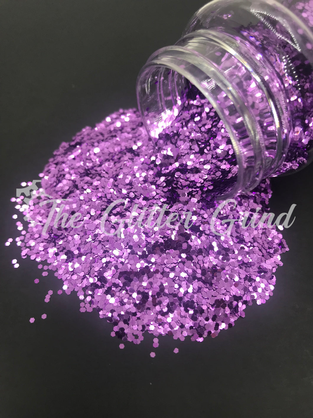 Wisteria purple 1/24 size chunky basic metallic glitter. Polyester glitter 2 oz by weight. Bottled glitter.