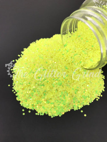 Pineapple express yellow 1/24 size chunky color shift glitter. Polyester glitter 2 oz by weight. Bottled glitter.