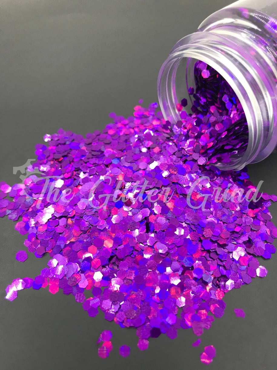Purple rain 1/10 size jumbo holographic glitter. Polyester glitter 2 oz by weight. Bottled glitter.