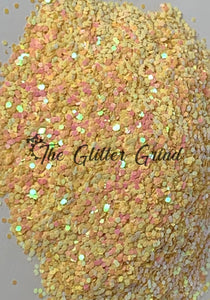 Peaches and cream 1/24 size chunky color shift glitter. Polyester glitter 2 oz by weight. Bottled glitter.