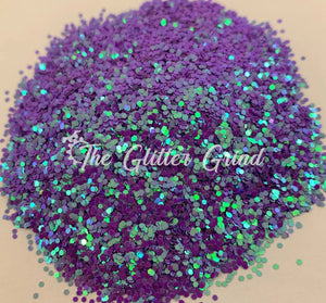 Roxy purple blue green 1/24 size chunky color shift glitter. Polyester glitter 2 oz by weight. Bottled glitter.