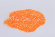Load image into Gallery viewer, Twisted tangerine orange 1/128 size ultra fine rainbow glitter. Polyester glitter 2 oz by weight.