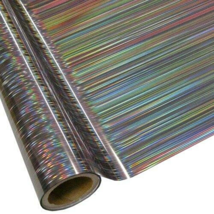 Roll of hot press foil with silver color background and hologram lines pattern. Can be used for multiple craft projects.