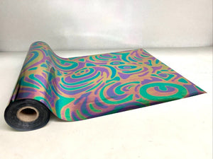 Roll of hot press foil with green yellow and purple razzle dazzle pattern. Can be used for multiple craft projects.