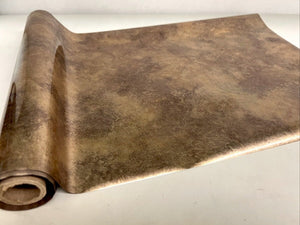 Roll of hot press foil with stonewashed gold color and patina pattern. Can be used for multiple craft projects.