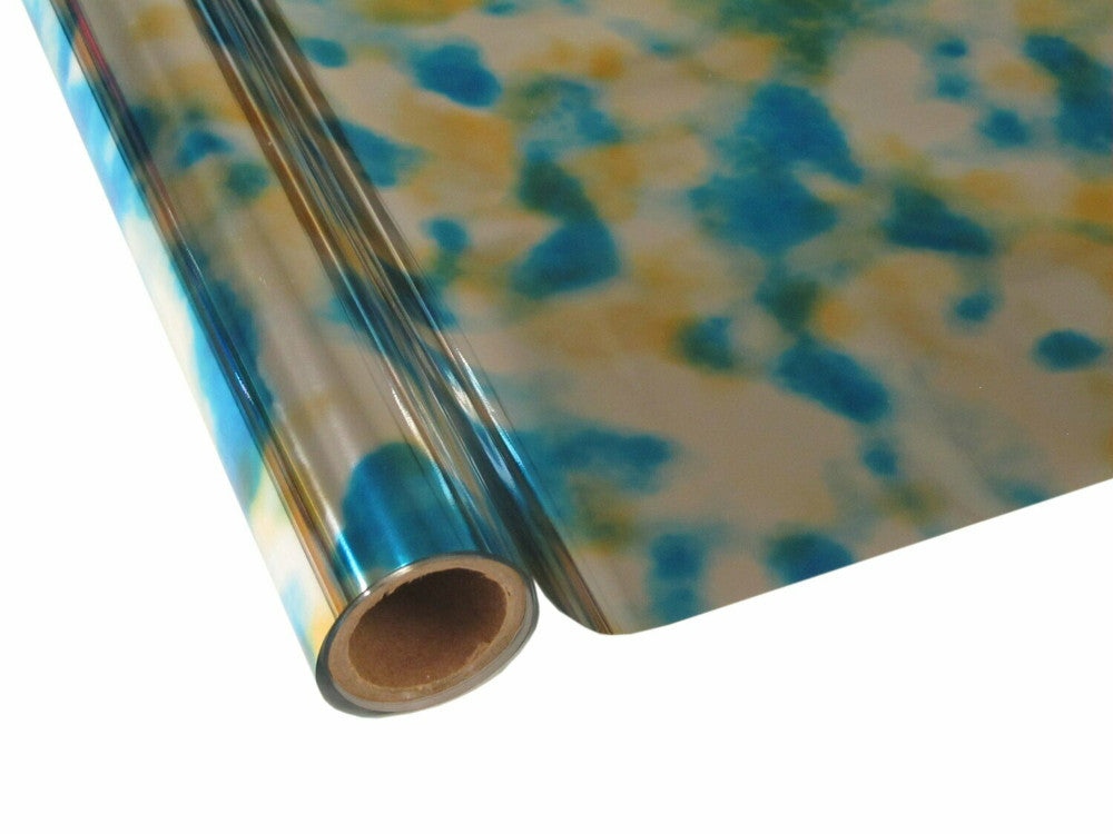 Roll of hot press foil with silver yellow and blue tie dye pattern. Can be used for multiple craft projects.
